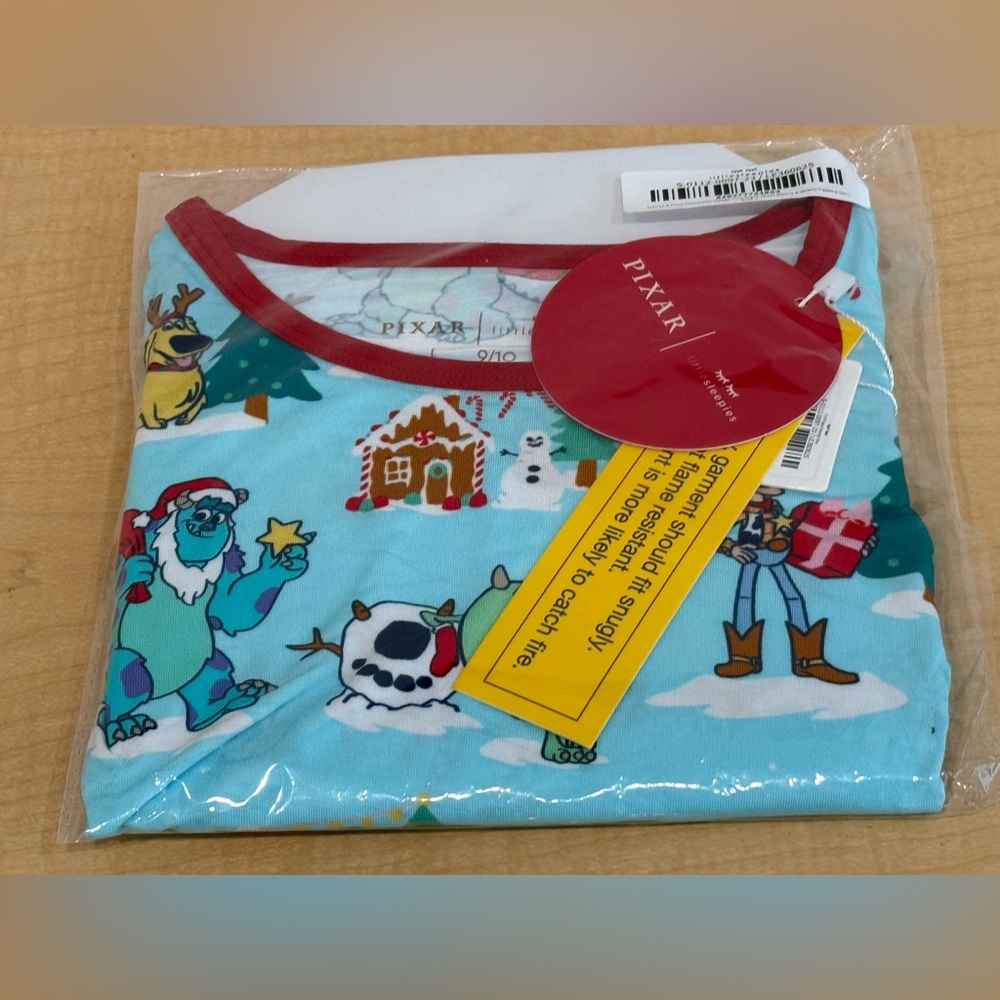 Little Sleepies Disney and Pixar Christmas village size 9/10
